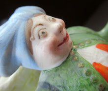 Load image into Gallery viewer, Bisque Porcelain Figure by Schafer &amp; Vater. Match Holder in the Form of a Lady Carrying a Basket 
