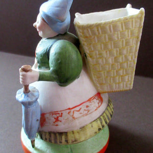 Bisque Porcelain Figure by Schafer & Vater. Match Holder in the Form of a Lady Carrying a Basket 