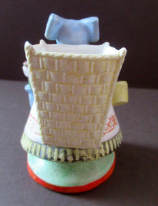 Bisque Porcelain Figure by Schafer & Vater. Match Holder in the Form of a Lady Carrying a Basket 