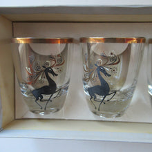 Load image into Gallery viewer, Black Reindeers. Vintage 1960s Set of Six Wee Shot Glasses with Stylised Black and Gold Reindeer Design
