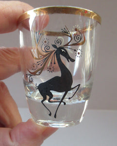 Black Reindeers. Vintage 1960s Set of Six Wee Shot Glasses with Stylised Black and Gold Reindeer Design