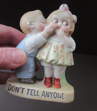 Load image into Gallery viewer, Porcelain Match Holder by Schafer &amp; Vater. GOOGLE EYED COUPLE EMBRACING
