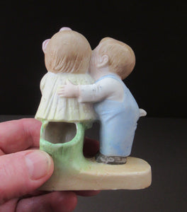 Porcelain Match Holder by Schafer & Vater. GOOGLE EYED COUPLE EMBRACING