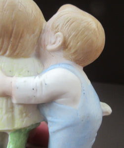 Porcelain Match Holder by Schafer & Vater. GOOGLE EYED COUPLE EMBRACING