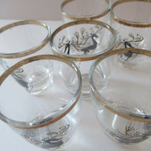 Load image into Gallery viewer, Black Reindeers. Vintage 1960s Set of Six Wee Shot Glasses with Stylised Black and Gold Reindeer Design
