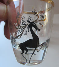 Load image into Gallery viewer, Black Reindeers. Vintage 1960s Set of Six Wee Shot Glasses with Stylised Black and Gold Reindeer Design
