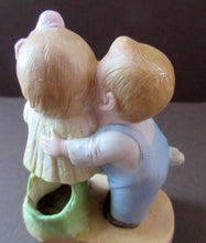 Load image into Gallery viewer, Porcelain Match Holder by Schafer &amp; Vater. GOOGLE EYED COUPLE EMBRACING
