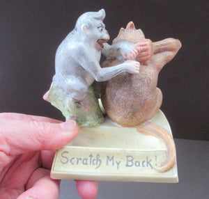 Porcelain Figurine by Schafer & Vater. Quirky GROOMING MONKEYS Match Holder & Striker