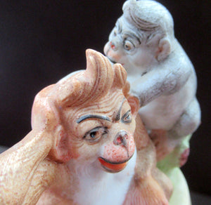 Porcelain Figurine by Schafer & Vater. Quirky GROOMING MONKEYS Match Holder & Striker