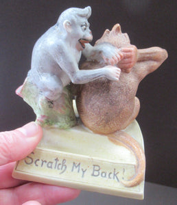 Porcelain Figurine by Schafer & Vater. Quirky GROOMING MONKEYS Match Holder & Striker