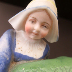 Schafer & Vater Figurine. Dutch Girl Carrying a Massive Fish