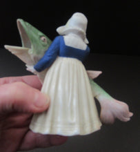 Load image into Gallery viewer, Schafer &amp; Vater Figurine. Dutch Girl Carrying a Massive Fish
