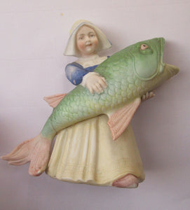 Schafer & Vater Figurine. Dutch Girl Carrying a Massive Fish
