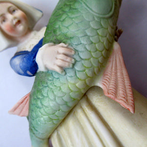 Schafer & Vater Figurine. Dutch Girl Carrying a Massive Fish