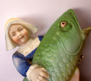 Schafer & Vater Figurine. Dutch Girl Carrying a Massive Fish