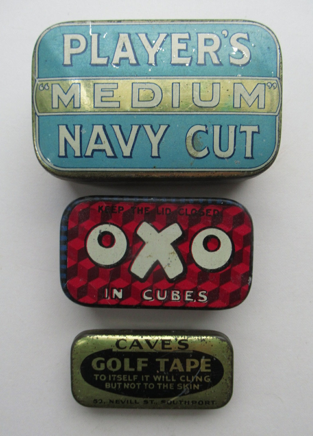 Three Vintage Advertising Tins: Players, Oxo and Cave's Golf Tape