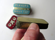 Load image into Gallery viewer, Three Vintage Advertising Tins: Players, Oxo and Cave&#39;s Golf Tape
