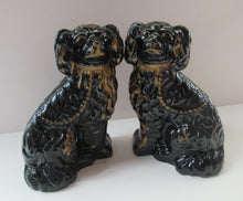 Load image into Gallery viewer, Antique STAFFORDSHIRE Black Jackfield Spaniels with Gold Highlights 
