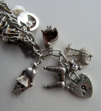 Load image into Gallery viewer, Vintage 1950s Sterling Silver Charm Bracelet
