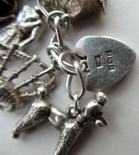 Load image into Gallery viewer, Vintage 1950s Sterling Silver Charm Bracelet
