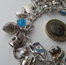 Load image into Gallery viewer, Vintage 1950s Sterling Silver Charm Bracelet
