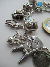 Load image into Gallery viewer, Vintage 1950s Sterling Silver Charm Bracelet
