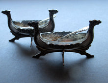 Load image into Gallery viewer, NORWEGIAN SILVER: Pair of Matching Viking Ship Salt Cellars. With Original Clear Glass Liner &amp; Later Additional Spoons
