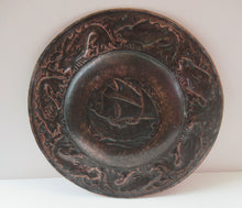 Load image into Gallery viewer, LARGE Antique NEWLYN School Charger. With Central Galleon Motif and a Frieze of Fishes Around the Rim. Inscribed on Reverse
