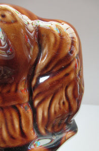 Antique Staffordshire Spaniel's Head Money Box or Saving Bank. Treacle Glaze
