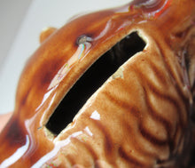 Load image into Gallery viewer, Antique Staffordshire Spaniel&#39;s Head Money Box or Saving Bank. Treacle Glaze

