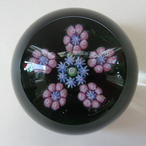 1970s Perthshire Paperweight with Star-Shaped Clusters on Transluscent Emerald Green Base