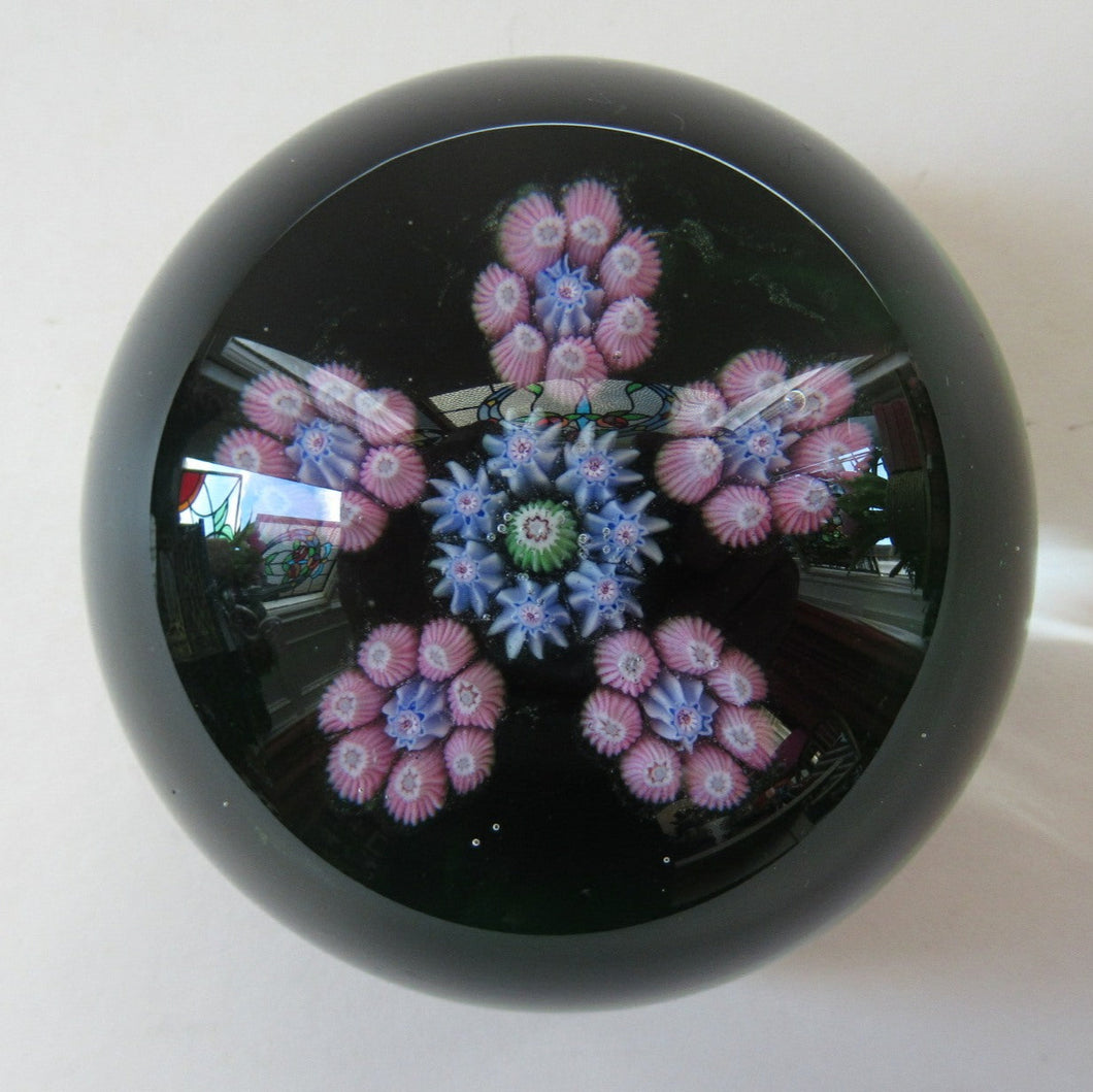 1970s Perthshire Paperweight with Star-Shaped Clusters on Transluscent Emerald Green Base