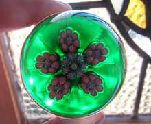 Load image into Gallery viewer, 1970s Perthshire Paperweight with Star-Shaped Clusters on Transluscent Emerald Green Base
