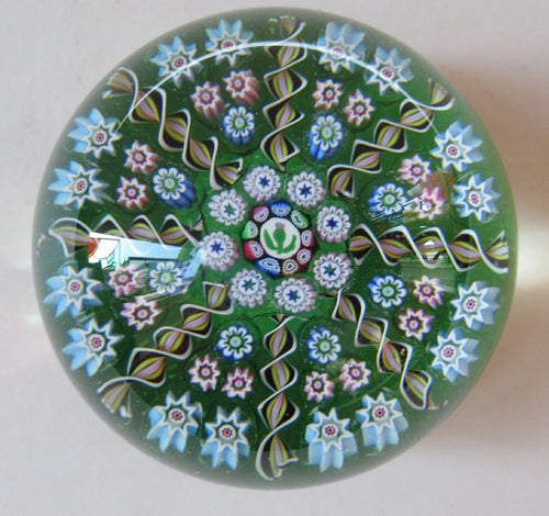 John Deacons Perthshire 8 Spoke Paperweight Thistle Cane. Green Base