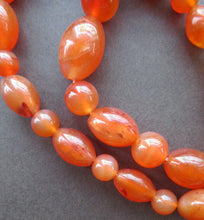 Load image into Gallery viewer, Vintage Carnelian Agate Amber Coloured Beads Necklace. Length: 23 inches
