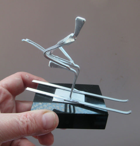 Scottish Horseshoe Nail Sculpture of a Skiing Man