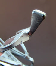 Load image into Gallery viewer, Scottish Horseshoe Nail Sculpture of a Skiing Man

