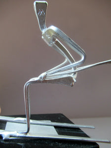 Scottish Horseshoe Nail Sculpture of a Skiing Man