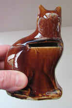 Load image into Gallery viewer, Antique Pottery Money Bank Box in the Shape of a Cat. Treacle Glaze
