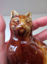 Load image into Gallery viewer, Antique Pottery Money Bank Box in the Shape of a Cat. Treacle Glaze
