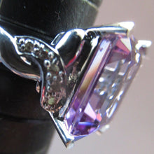 Load image into Gallery viewer, Pretty 9 CT White Gold Ring Set with an Emerald Cut Amethyst &amp; flanked with decorative diamond chips. Size N 1/2
