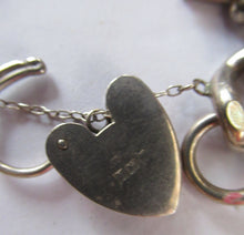 Load image into Gallery viewer, Heavy Weight. Vintage Silver Bracelet with 19 Quality Charms. Hallmarked Padlock Catch
