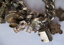 Load image into Gallery viewer, Heavy Weight. Vintage Silver Bracelet with 19 Quality Charms. Hallmarked Padlock Catch
