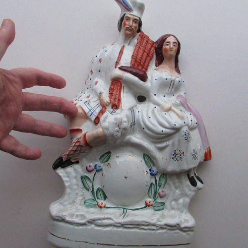 Genuine Staffordshire Flatback Figurine. Poor Man's Clock