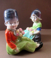 Load image into Gallery viewer, Vintage 1930s / 1940s Ceramic DUTCH Boy and Girl Pair of Bookends 
