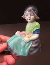 Load image into Gallery viewer, Vintage 1930s / 1940s Ceramic DUTCH Boy and Girl Pair of Bookends
