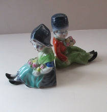 Load image into Gallery viewer, Vintage 1930s / 1940s Ceramic DUTCH Boy and Girl Pair of Bookends 
