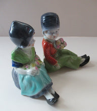 Load image into Gallery viewer, Vintage 1930s / 1940s Ceramic DUTCH Boy and Girl Pair of Bookends 
