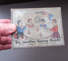 Load image into Gallery viewer, ANTIQUE 1920s German Tin Plate Pair of Spinning Tops. Complete in Original Box
