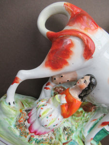 Unusual Antique Staffordshire Cow and Milkmaid Spill Vase and Milk Jug